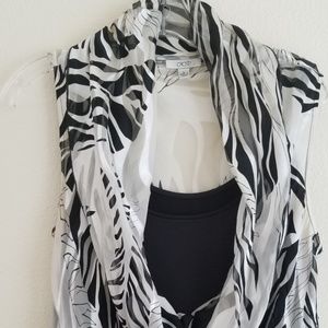 Cach'e black & white animal print silk top.